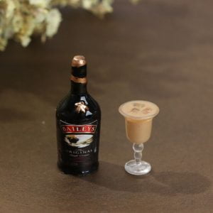 Add a miniature Bailey's bottle to your animal...